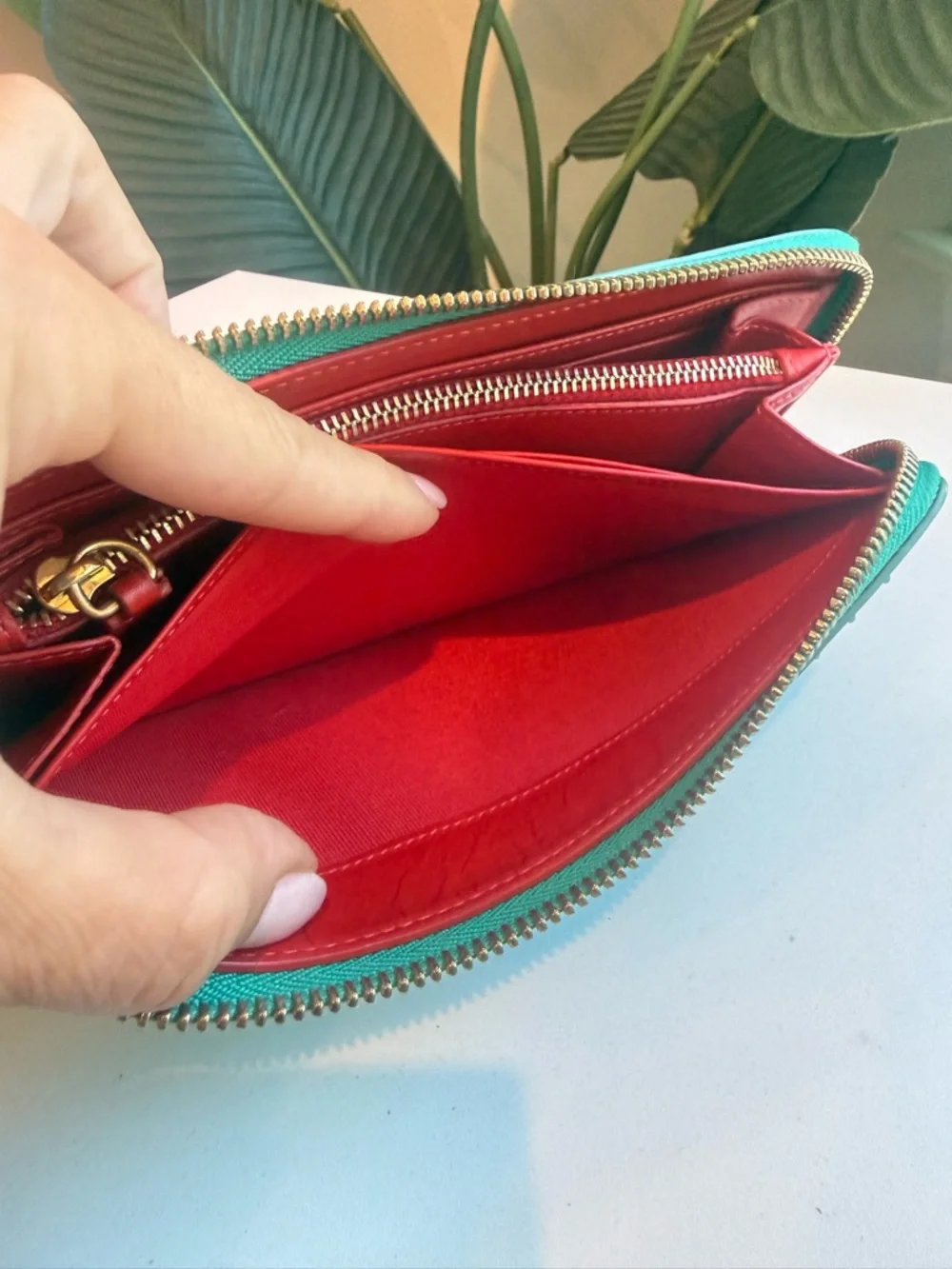 Christian Louboutin ‘Turquoise Zippy Wallet’